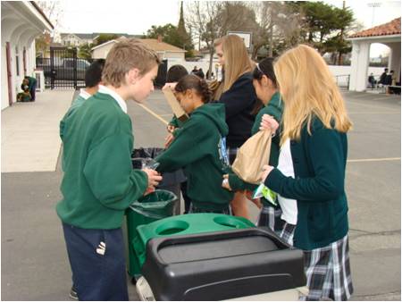 Students at St. Michael School in Livermore, California, teach other students to sort their trash into different bins