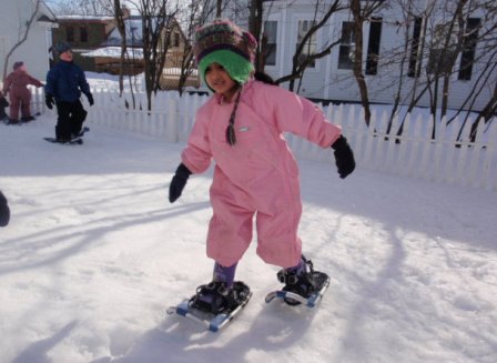 Girl on snowshoes