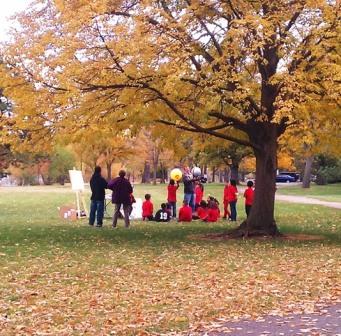 Golden leaves were still on the trees in Sloan's Lake Park in Denver at the end of October 2012 when preservice teachers from the education department at Metropolitan State University in Denver practiced their teaching in the outdoors with Colfax Elementary School students.