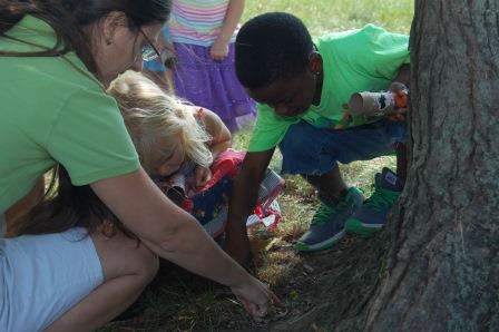 early childhood students with teacher