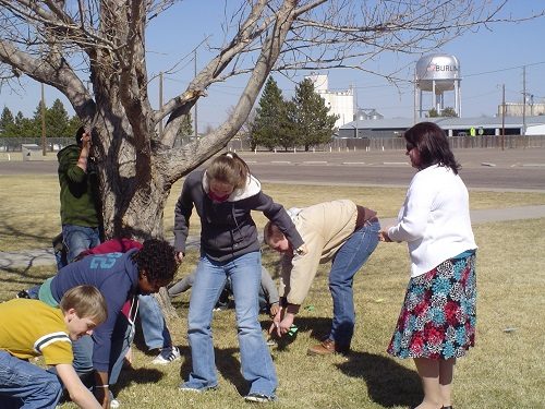 teacher-and-students-participate-in-every-tree-for-itself-plt-activity