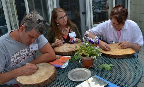 teachers-examining-tree-cookies