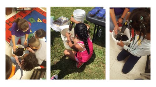 young-children-with-teacher-examine-soil-in-bucket