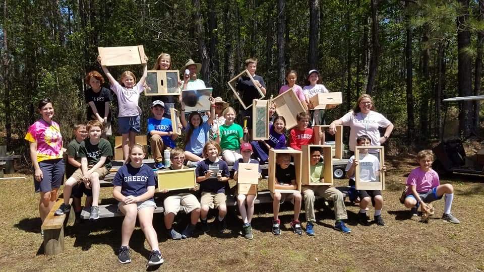 students-show-bee-boxes-frames