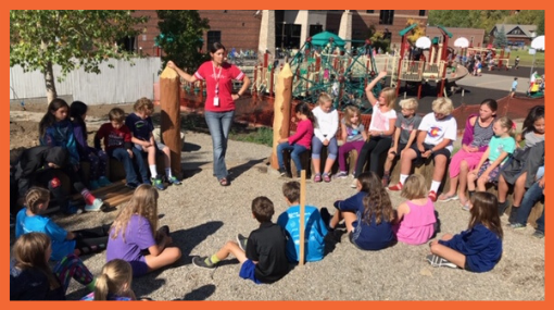 students in class outdoors