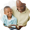 Dad reading to his son