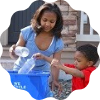 Mother and son recycling