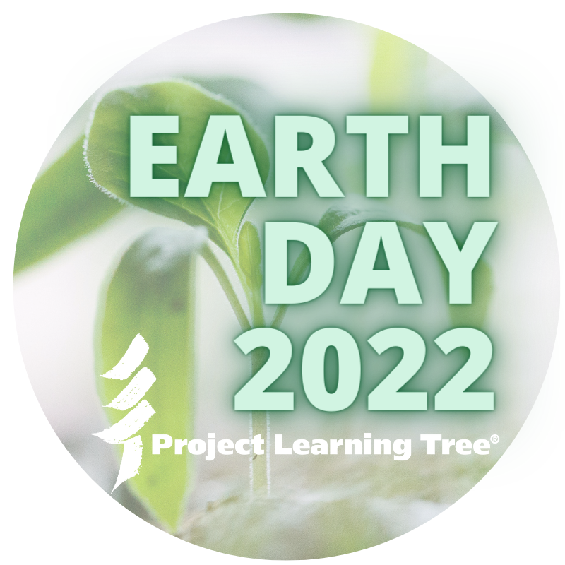 earth day 2022 over a photo of seedlings sprouting