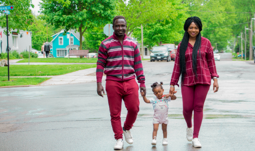 family walking around neighborhood