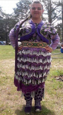 young woman in a purple jingle dress
