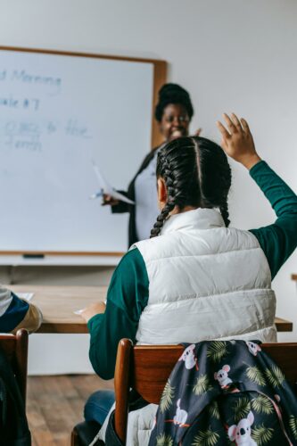 Girl raising hand